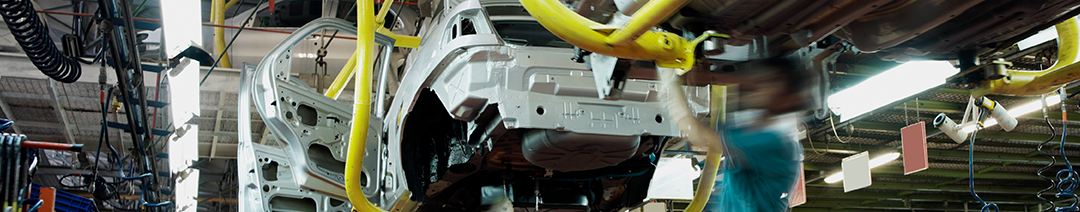 Image of a car's bodywork on a manufacturing line